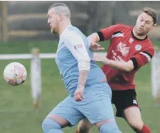  ??  ?? Silksworth CW (red) take on Harton &amp; Westoe in the Wearside League