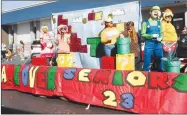  ?? Westside Eagle Observer/SUSAN HOLLAND ?? The senior class at Gravette High School announces to Green Forest that it’s “Game Over” with its float in the 2022 homecoming parade. The seniors won the prize for class floats with their entry with a Mario game theme.