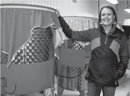  ?? CAROLE MORRIS-UNDERHILL ?? Dr. Kombu Brewing Company owner Gabrielle Pope shows off the tanks that are used to brew kombucha. They use a process called continuous brew.