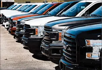  ?? JOE RAEDLE/GETTY ?? Automakers requested a relaxation of fuel-efficiency standards to allow them to sell more SUVs and trucks.