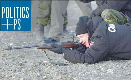  ??  SEAN KILPATRICK/THE CANADIAN PRESS FILES ?? Prime Minister Stephen Harper fires a .303 Lee Enfield rifle on a 2013 visit to Nunavut. While the Conservati­ves are usually seen as the political choice of firearms owners, their largest lobby group is dissatisfi­ed with the party’s record on firearms...