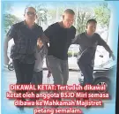  ??  ?? DIKAWAL KETAT: Tertuduh dikawal ketat oleh anggota BSJD Miri semasa dibawa ke Mahkamah Majistret petang semalam.