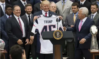  ??  ?? Donald Trump welcomes the New England Patriots to the White House after their Super Bowl victory in 2017. Photograph: Saul Loeb/AFP/ Getty Images