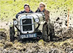  ??  ?? Competitor­s in the Vintage Sports-car Club’s annual off-road trial near Presteigne, Wales
