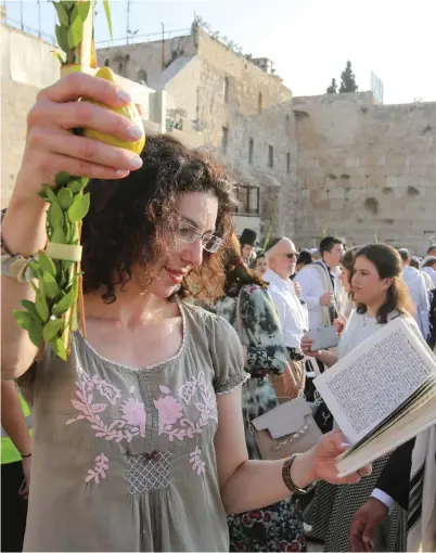  ?? (Marc Israel Sellem/The Jerusalem Post) ?? CELEBRATIN­G SUKKOT in Jerusalem.