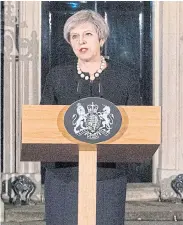  ??  ?? British Prime Minister Theresa May speaks outside 10 Downing Street.