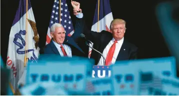  ?? AP FILE ?? Then-presidenti­al candidate Donald Trump and vice presidenti­al candidate Mike Pence at a 2016 rally in Des Moines.