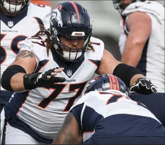  ?? Aaron Ontiveroz ?? The Broncos' Quinn Meinerz drills against Bobby Massie during training camp on Aug. 19.