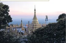  ??  ?? Mandalay Hill is 240m high and offers a panoramic vantage point to view the sunset. Sutaungpye­i Pagoda at the top of the hill is accessible by four covered stairways, though a road now offers easy access. An escalator completes the last leg of the...