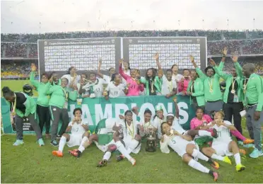  ??  ?? Cameroon the victorious Super Falcons celebrate their ninth AWCON title