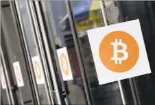  ?? MARK LENNIHAN — THE ASSOCIATED PRESS FILE ?? A bitcoin sell-off that began at the beginning of the week is gaining momentum, with a quarter of its value evaporatin­g in the past 24 hours.