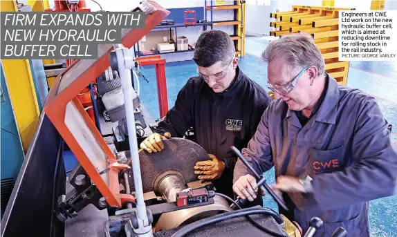  ?? PICTURE: GEORGE VARLEY ?? Engineers at CWE Ltd work on the new hydraulic buffer cell, which is aimed at reducing downtime for rolling stock in the rail industry.