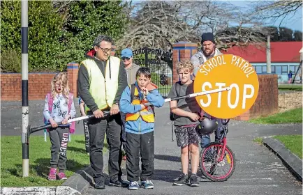  ??  ?? Stratford Primary School Principal Jason Elder and school patrol member Noah West-Adam, 12, were happy with the decision.