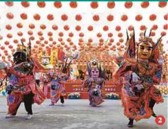  ?? EPA PIC ?? 2. People dressed as Chinese gods performing a dance to mark the start of the Lunar New Year at the Siam Tai Tien Kong shrine in Samut Prakan province, Thailand, on Tuesday. 2