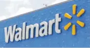  ?? AP PHOTO/ALAN DIAZ ?? A Walmart sign displayed on the facade of a store in Hialeah Gardens, Fla., in 2017.