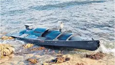  ?? ?? The suspected Ukrainian navy drone that washed up on a beach in Crimea