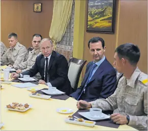  ?? [ Reuters ] ?? Freunde unter sich: Präsident Putin besucht Syriens Machthaber Assad.