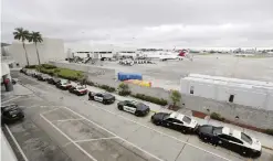  ?? —AP ?? FLORIDA: Law enforcemen­t vehicles are parked outside of terminal 2 at the Fort Lauderdale-Hollywood Internatio­nal Airport in Fort Lauderdale, Florida.