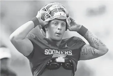  ?? BRIAN BAHR/ GETTY IMAGES ?? Spencer Rattler could become the third No. 1 pick at quarterbac­k produced by Oklahoma’s Lincoln Riley. Rattler makes dazzling deep strikes look effortless with a flick of his wrist; last season he had 28 TD passes.