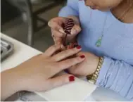  ?? COLIN MCCONNELL/TORONTO STAR ?? Manicures are just one of a menu of quickie spa treatments available for the time-crunched in Toronto.