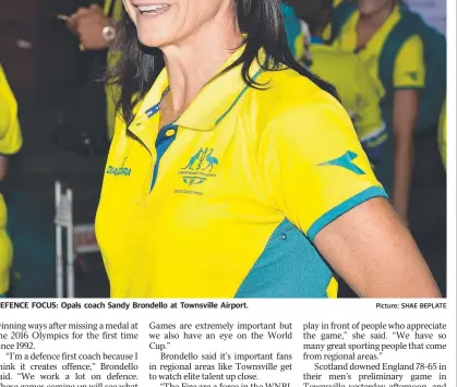  ?? DEFENCE FOCUS: Opals coach Sandy Brondello at Townsville Airport. Picture: SHAE BEPLATE ??