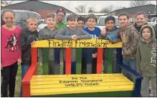  ?? Contribute­d photo ?? Northside students Destiny Ware, Mason Cheatwood, Cody Addison, Elon Cosby, Payton Pope, Aden Jiles, Spencer Hicks, Danny Deleon, Hayden Williams, Macy Myers and Ethan Campbell stand around one of two Friendship benches at the school.