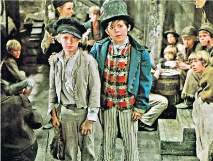  ??  ?? Artful dodge: Oliver! (1968) fleshes out the plot of Dickens’s Oliver Twist