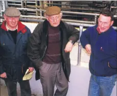  ??  ?? Harry O’Grady, Clogheen (centre), with John and Ken O’Donnell, from Cappoquin, at the mart in Fermoy in March 2000.