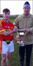  ??  ?? Horeswood captain David Murphy with Denis Nolan (Chairman).