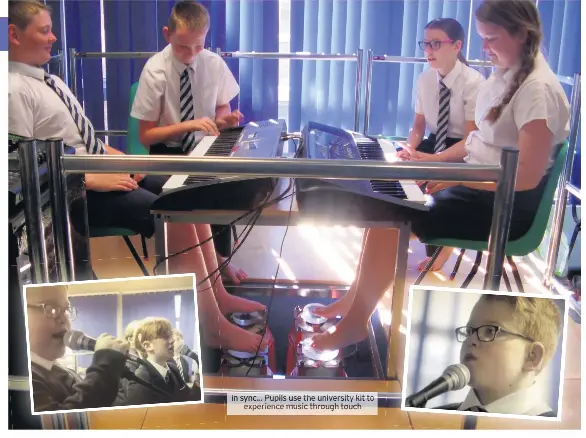  ??  ?? In sync... Pupils use the university kit to experience music through touch