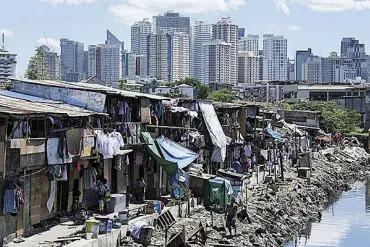  ?? PHOTO BY NOEL CELIS/AFP ?? “Affordable housing is adequate in quality and location and does not cost so much that it prohibits its occupants from meeting other basic living costs or threatens their enjoyment of basic human rights.” — United Nations Human Settlement­s Program.