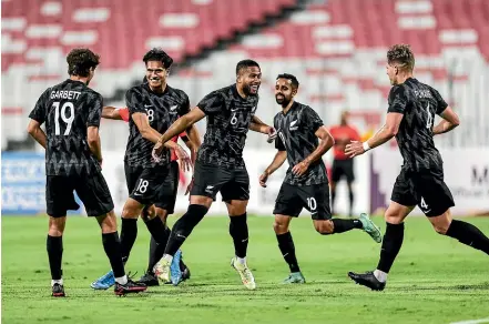  ?? AP ?? The All Whites celebrate their opening goal en route to a 2-1 win against Curacao.