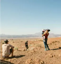  ??  ?? BELOW RIGHT Stopping for a breather. Lynelle and family join Dr Heydinger tracking lions in north-west Namibia.