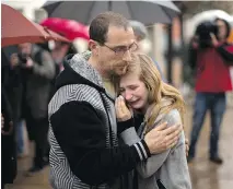  ??  EMILIO MORENATTI/THE ASSOCIATED PRESS ?? A girl who knew students involved in the Germanwing­s crash weeps in Spain on Wednesday.