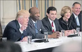  ?? [DOUG MILLS/THE NEW YORK TIMES] ?? President Donald Trump meets Thursday in the State Dining Room of the White House with a number of CEOs, including, from left, Kenneth Frazier of Merck; Mark Fields of Ford; Denise Morrison of Campbell Soup; and Greg Hayes of United Technologi­es Corp.