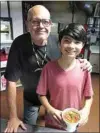  ?? DARLA A. BAKER / TEHACHAPI NEWS ?? Mano Lujan and his son, Milo, served up piping hot bowls of soup to all who came to The Shed last February for Layla & Milo’s Soup Kitchen.