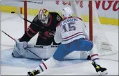  ?? ADRIAN WYLD — THE CANADIAN PRESS VIA AP ?? Montreal Canadiens center Jesperi Kotkaniemi fires the puck wide past Ottawa Senators goalie Joey Daccord.