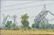  ?? PTI ?? ▪ High tension wires that collapsed in Wednesday's thundersto­rm near Agra on Friday