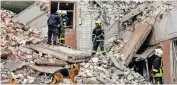  ?? | Reuters ?? RESCUERS work at the site of a destroyed building during a Russian missile strike in Chernigiv, Ukraine yesterday.