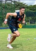  ??  ?? Pace maker: Jimmy Andersonn on the move and (right) James Bracey works on his fielding