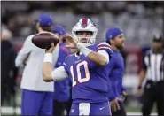  ?? BUTCH DILL — THE ASSOCIATED PRESS ?? Mitchell Trubisky warms up before the Bills-Saints game on Nov. 25 in New Orleans.