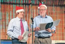  ??  ?? Michael Foreman and Tony Leighton perform a Christmas poem.