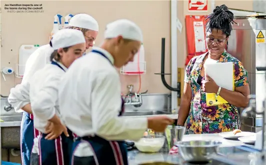  ?? PHOTO: SIMON O’CONNOR/STUFF ?? Jax Hamilton inspects one of the teams during the cookoff.