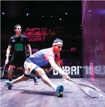  ??  ?? Mohamed El-Shorbagy (blue) against Ali Farag. (AN photo)