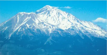  ?? Photos by Tom Stienstra / The Chronicle ?? Once reaching the summit of Mount Eddy, the full expanse of the 14,179-foot, 16-mile-wide Mount Shasta opens before you.