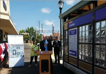  ?? DAN SOKIL — FOR DIGITAL FIRST MEDIA ?? SEPTA General Manager Jeff Knueppel, at podium, holds a new SEPTA key card while he and borough officials mark the official opening of a new bus station at Railroad Avenue on Thursday.