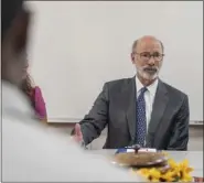  ?? ?? Governor Tom Wolf visits Manor College on Wednesday, May 18. He spoke at a roundtable discussion featuring Dr. Jonathan Peri, Manor College President.