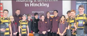  ??  ?? Hinckley Rugby Club Under 15 team players took part in a fundraisin­g bag-packing day at Sainsbury’s at The Crescent in Hinckley which generated more than £900 that was shared between the team and the store’s chosen charity Leicesters­hire Search and...