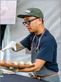  ?? FRANCISCO CHAVIRA — VISIT SACRAMENTO ?? Chef, founder and partner Billy Ngo, seen here at Sacramento's Farm to Fork Grand Tasting in September 2023, is known for his contempora­ry Japanese restaurant­s, including Kru.
