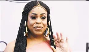  ?? Chris Pizzello / Associated Press ?? Actress and honoree Niecy Nash waves to photograph­ers at the 13th annual Essence Black Women in Hollywood Awards Luncheon in Beverly Hills, Calif.